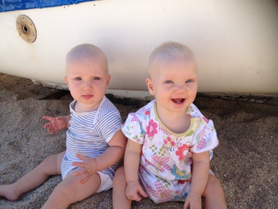 2 babies sitting up