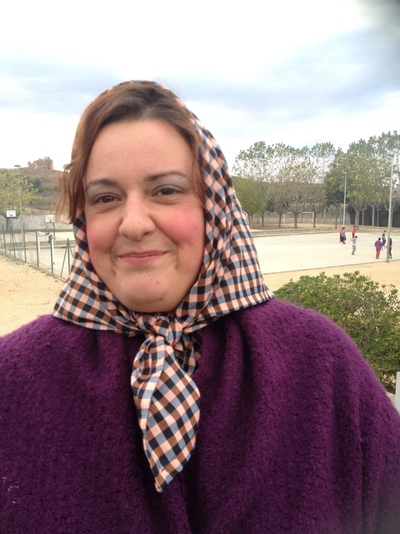 A lady dressed up as a chestnut seller