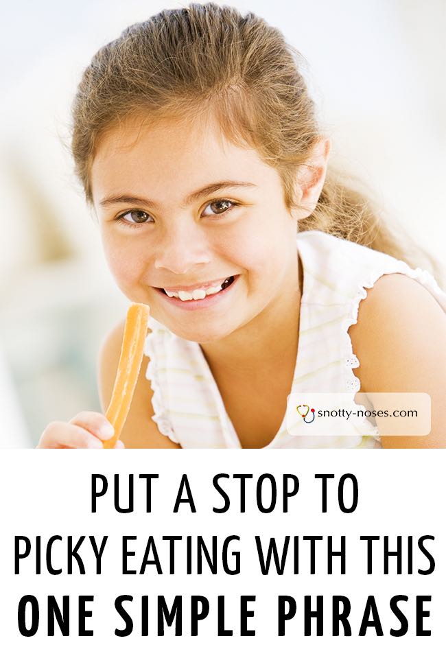 A girl smiling as she tries a new and strange food. #fussyeater #pickyeater #fussytoddler #fussypants #fussyeaters #healthyeatingkids 