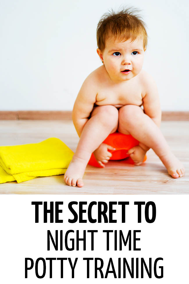 A little boy sitting on a red potty. The Secret to Successful Night Time Potty Training. Written by a pediatric doctor. #pottytraining #pottytrainingtips #nighttimepottytraining #toilettraining #pottytrainingtips #toddlers #toddlertips #lifewithtoddlers #parenting #parents #parenthood #parentlife #lifewithkids