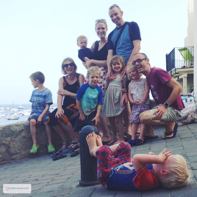 Quick family photo before ice cream? This toddler is not keen!