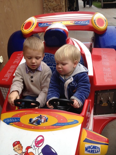 2 boys on a funfair ride