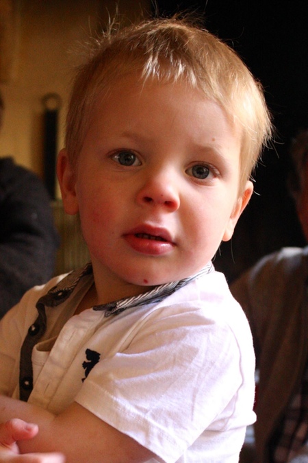 A little boy's face with dirt on it