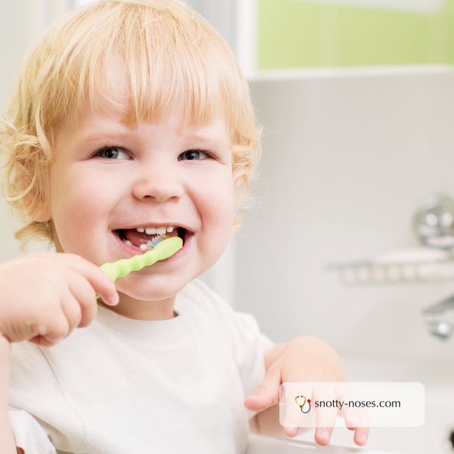 Brushing Children's Teeth by a pediatrician